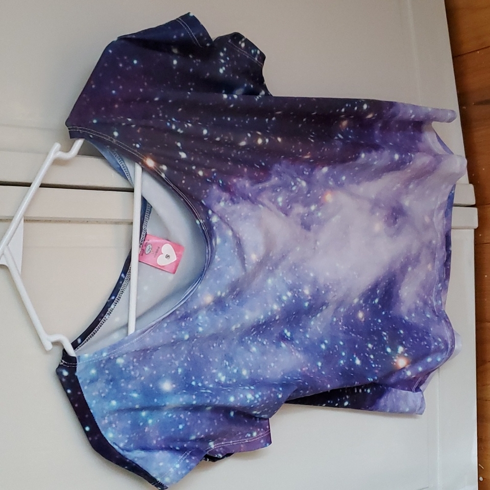 Galaxy crop top, size small. Will fit Med also.
